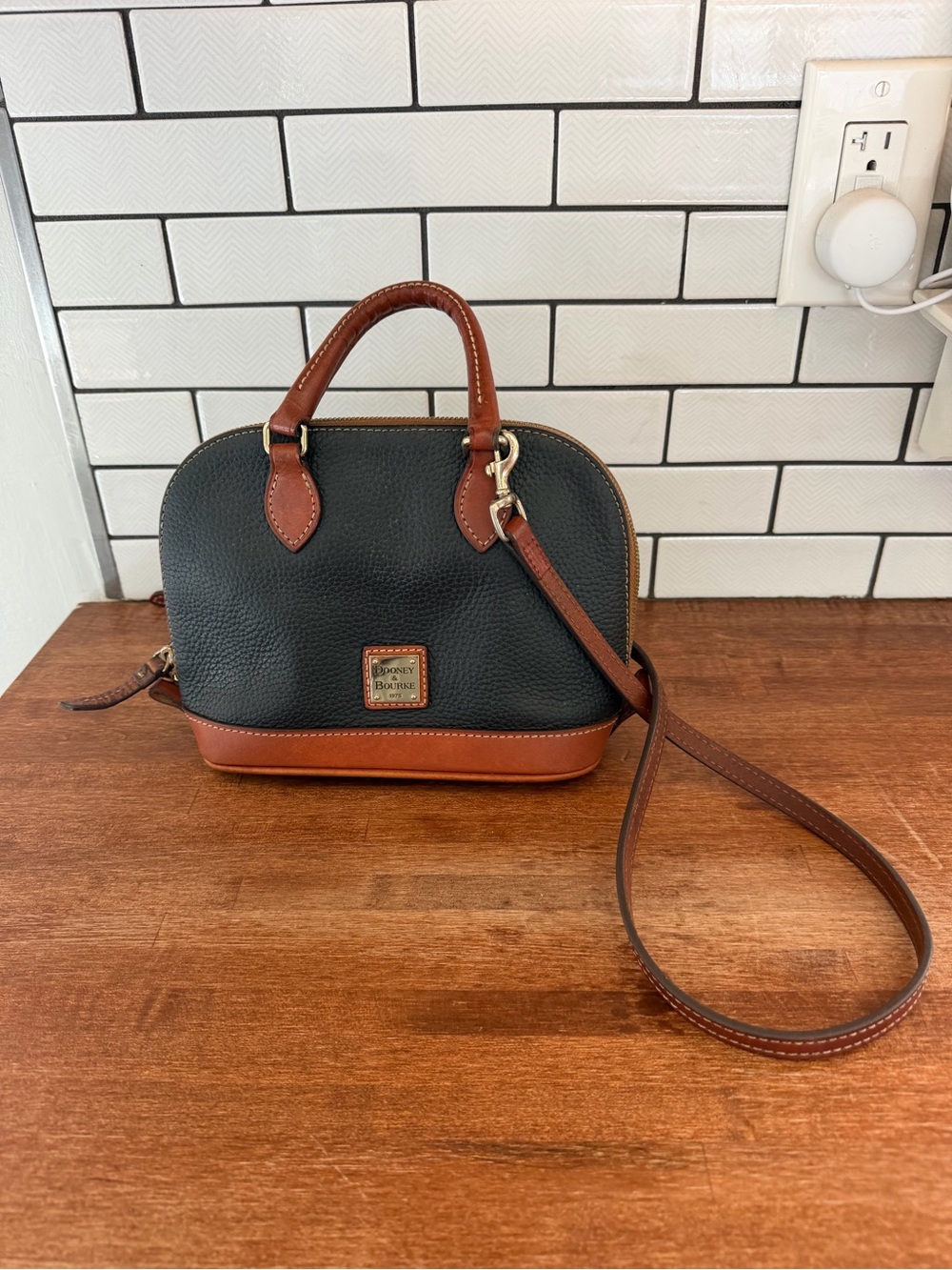 Dooney & Bourke Black with Brown Trim Pebbled Leather Dome Satchel